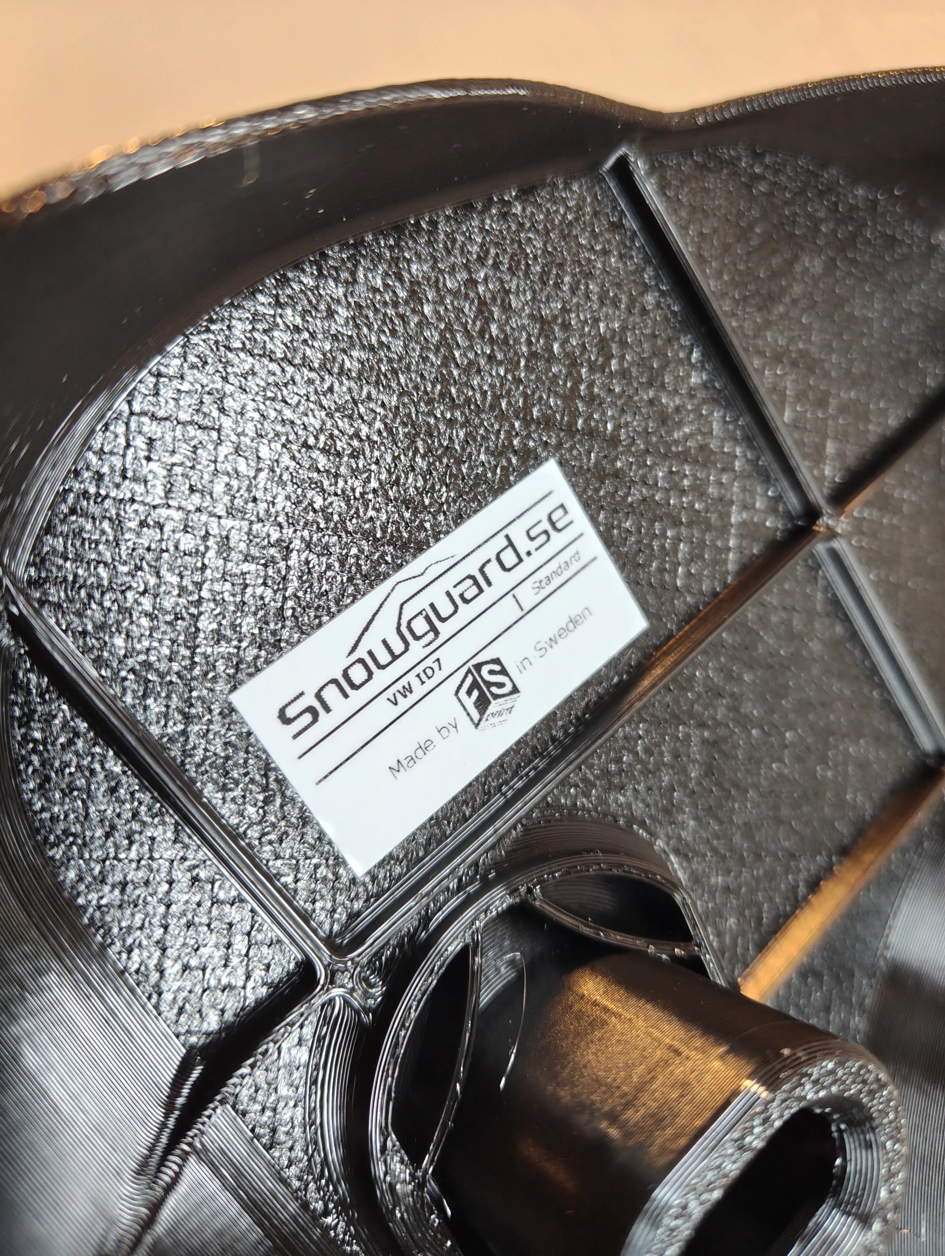 Snowguard latausportin suoja läheltä